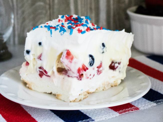 4th of july dessert - piece of red white and blue dessert lasagna on a plate