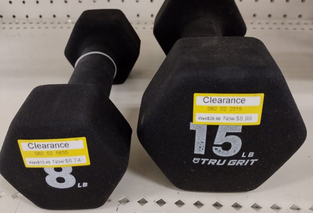 Clearance Handweights on a shelf at Target