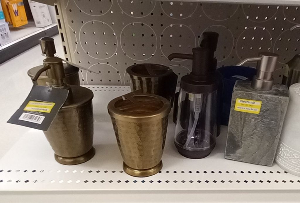 Shelf of bathroom accessories on Target clearance in Home